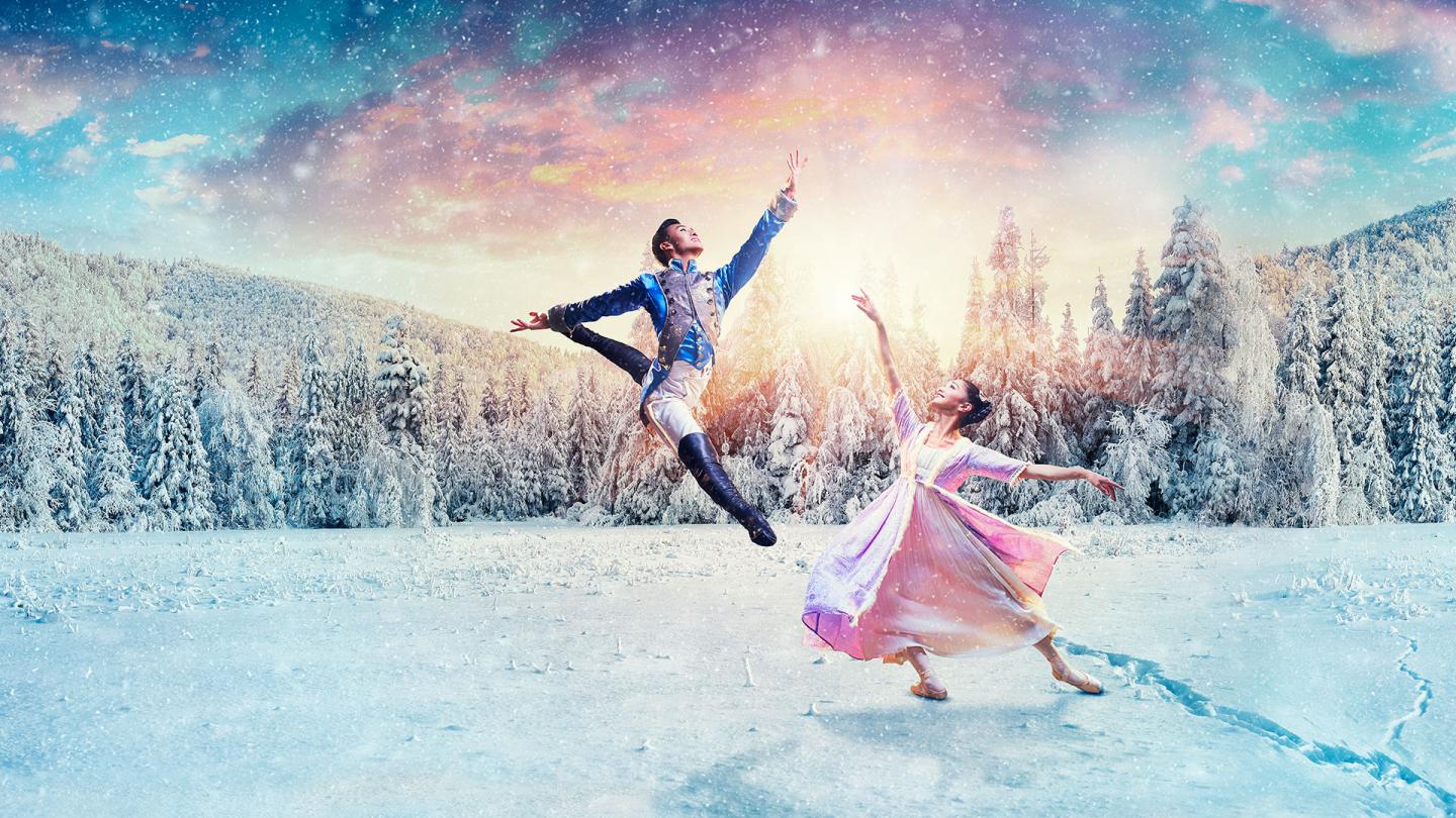 The Nutcracker Prince jumps high and Clara reaches up to catch him