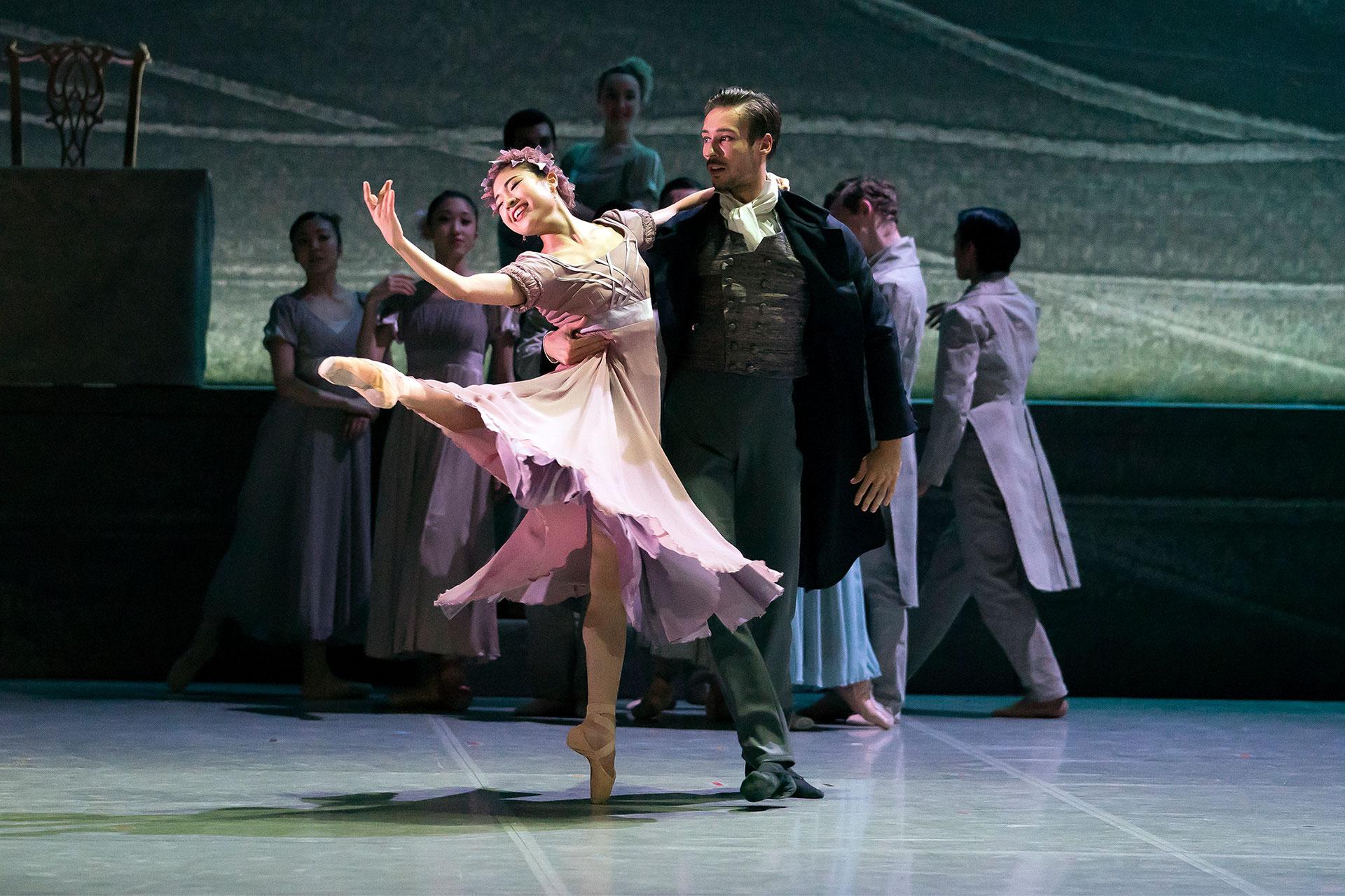 While he appears ambivalent, Rochester encourages Blanche as they dance together