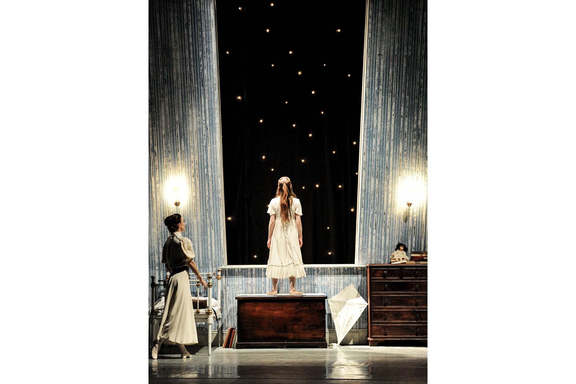 Peter Pan, production, 2009, Hannah Bateman and Pippa Moore, Mrs Darling and Wendy, photo Alastair Muir Wendy looks into the night hoping to catch a glimpse of her new friend, Peter