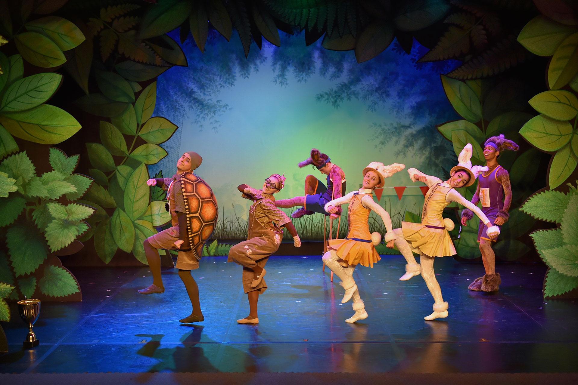 Molly the Mole and The Bunnies warm up with Tortoise at the start of the race