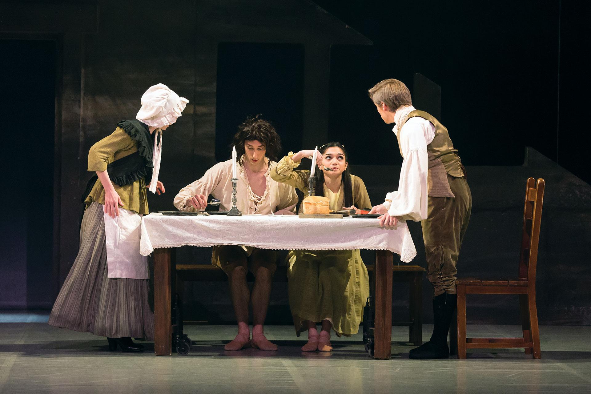 Young Cathy and her foster brother share a meal at home