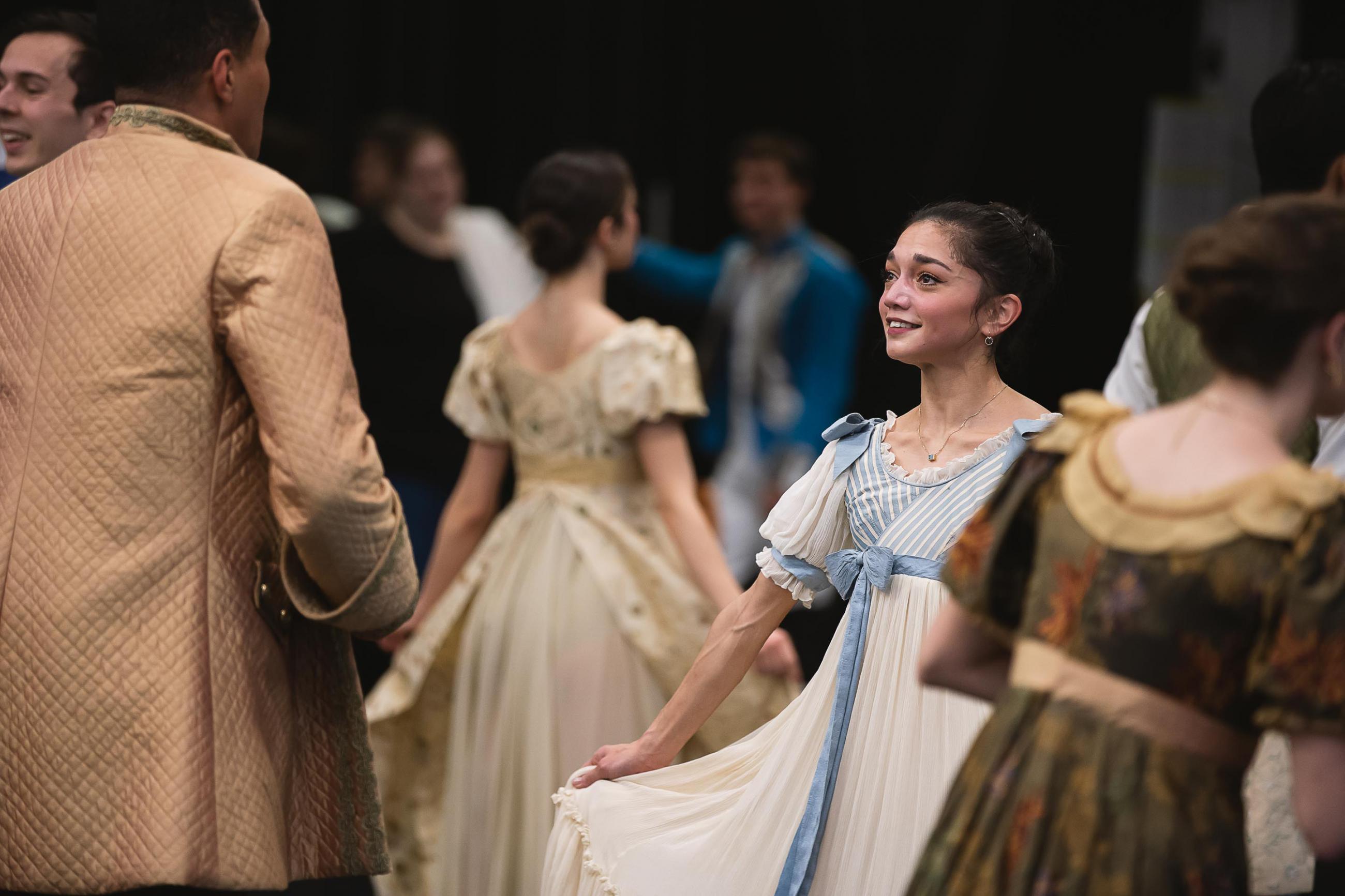 Close-up photo of dancers in costumes