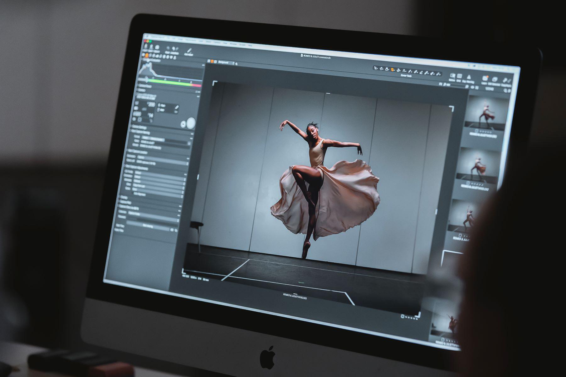 A preview shot of a dancer in a leaping pose is displayed on a monitor.