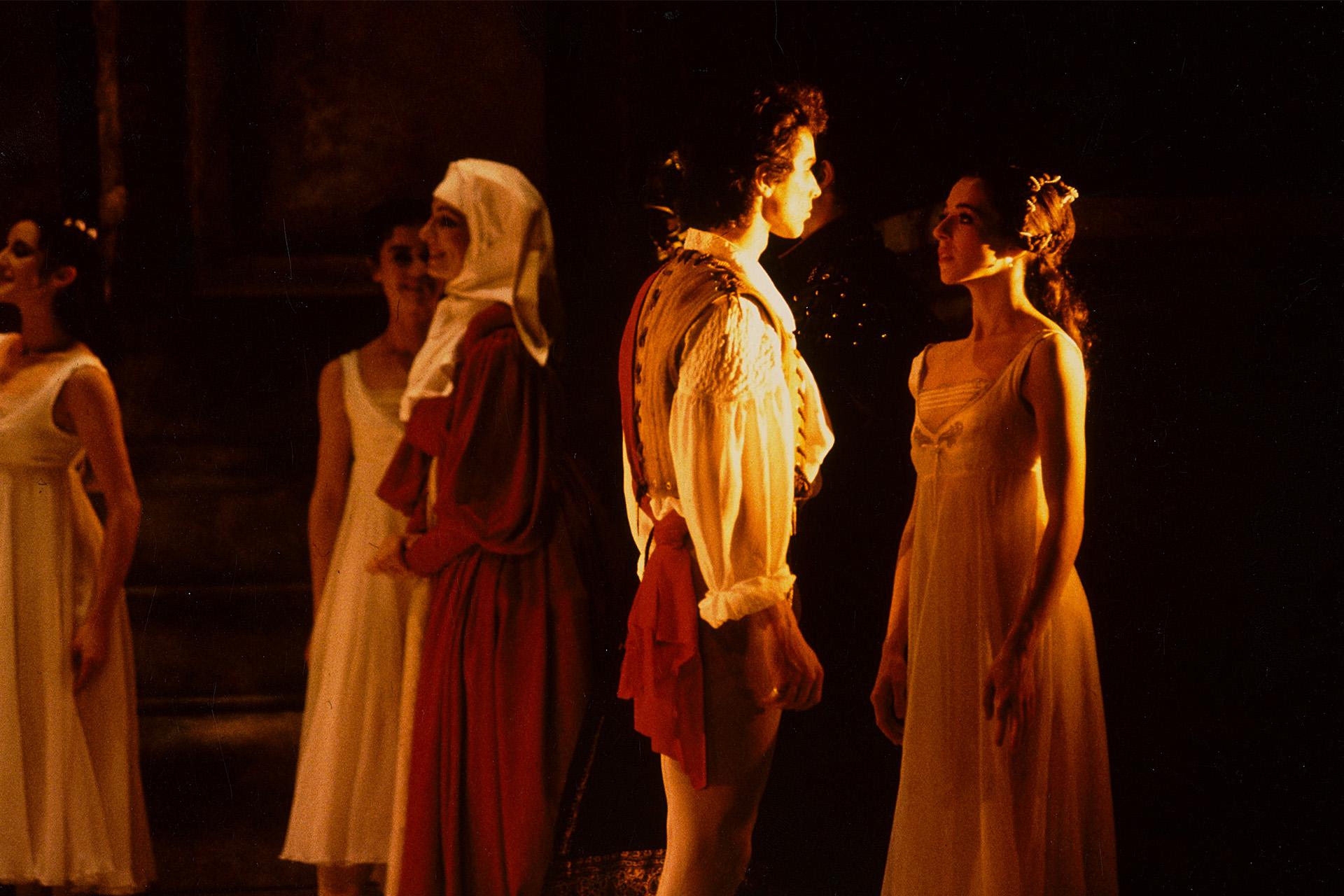 Two dancers gazing into each others eyes, performing in Romeo & Juliet