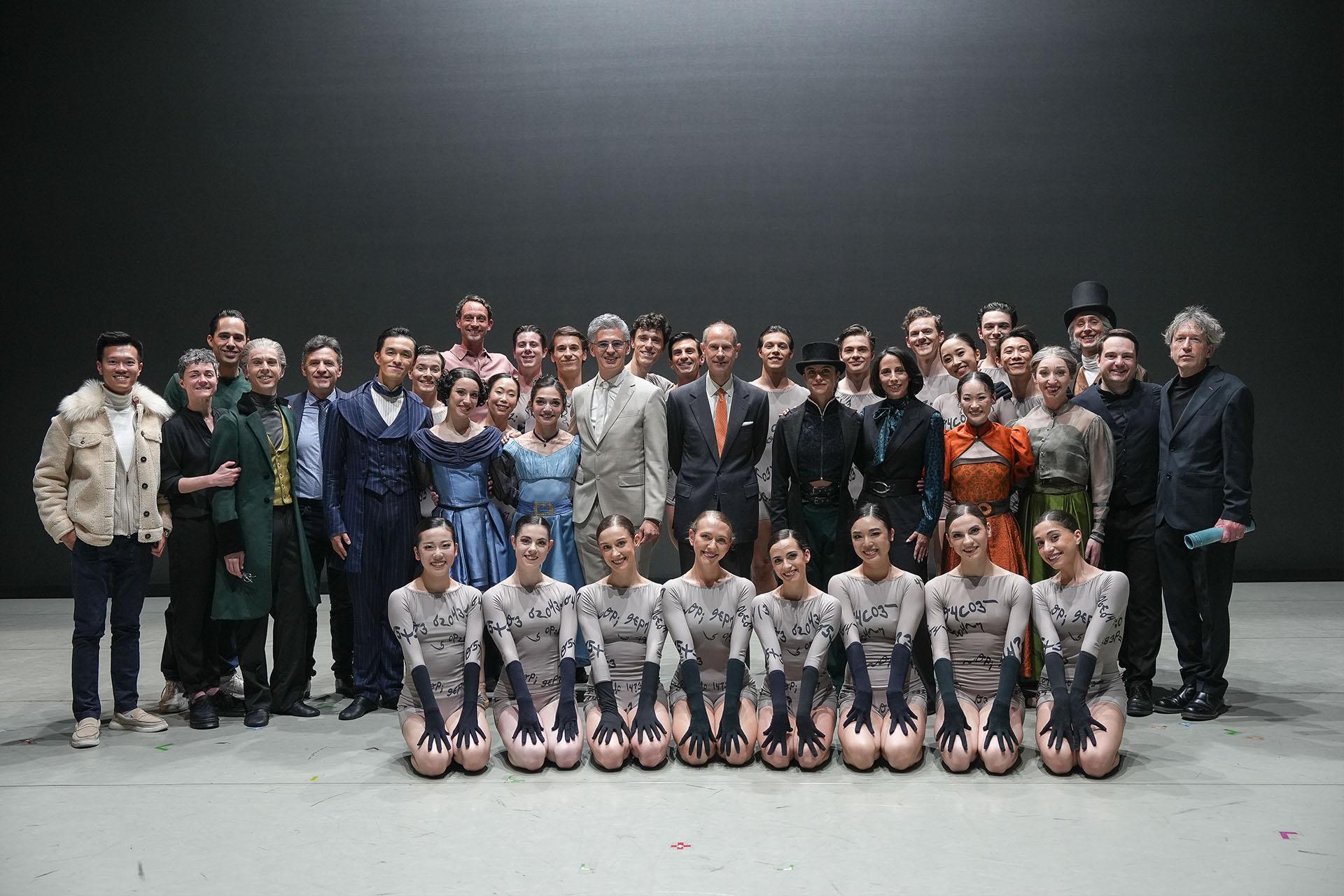 Group shot of Northern Ballet dancers and staff on stage with HRH The Duke of Edinburgh