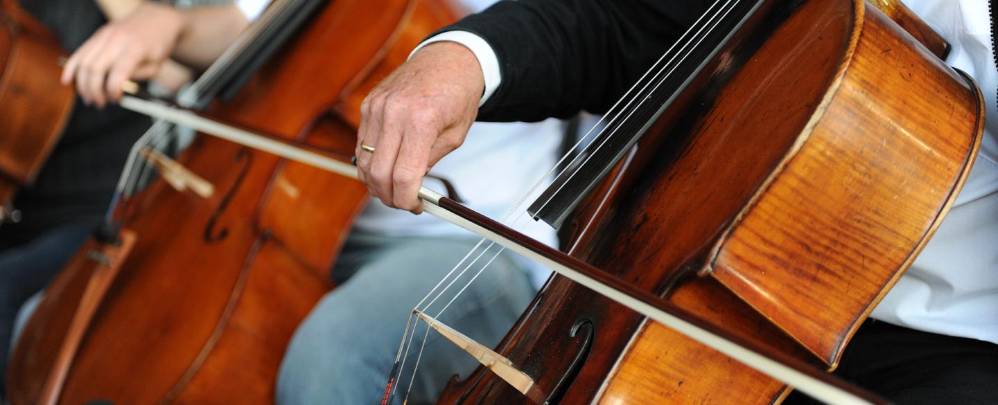 3 cello players
