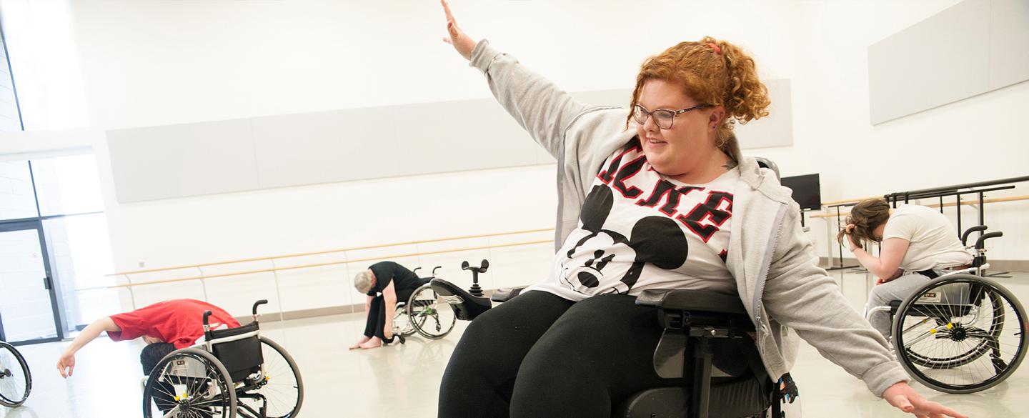 Wheelchair users enjoying a dance class