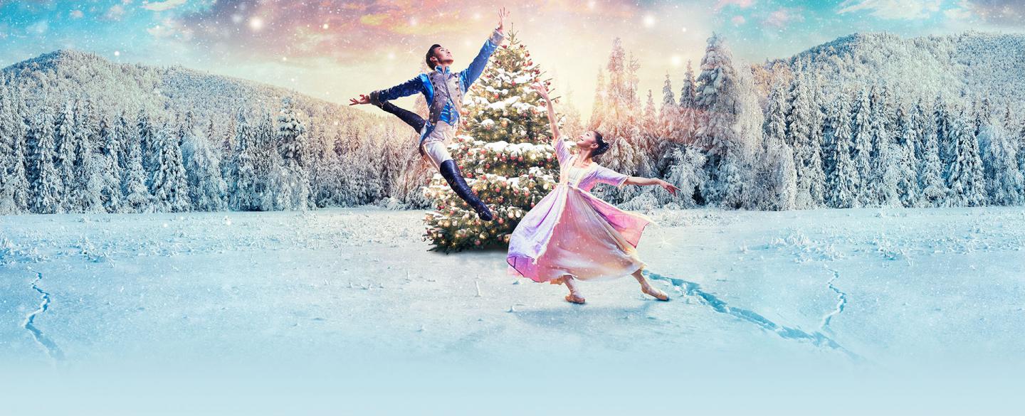 The Nutcracker Prince jumps high and Clara reaches up to catch him
