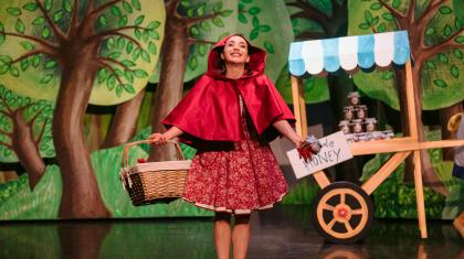 Little Red takes a basket of goodies through the forest to her Grandmother's house
