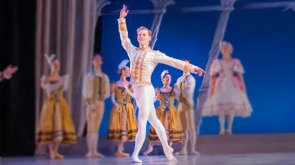 The Prince in his shimmering white finery