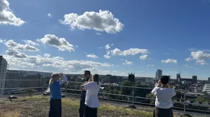 On Northern Ballet's HQ roof, the site of future solar panels and looking out at Leeds Minster