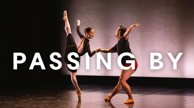 Two dancers stood in a balletic pose against a pink backdrop. Passing By is written across the image